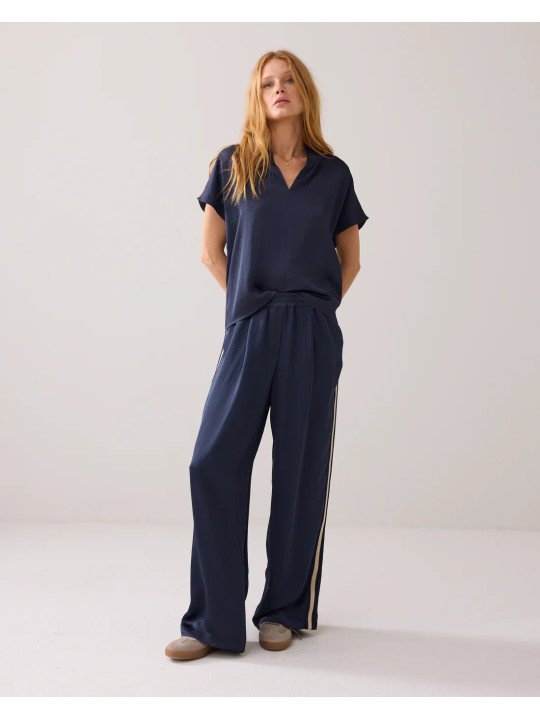 Pantalones con ribete